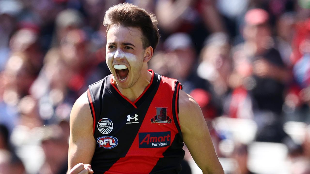 MELBOURNE. 19/03/2022. AFL. Round 1. Geelong vs Essendon at the MCG . Nic Martin of the Bombers celebrates a 2nd qtr goal . Photo by Michael Klein