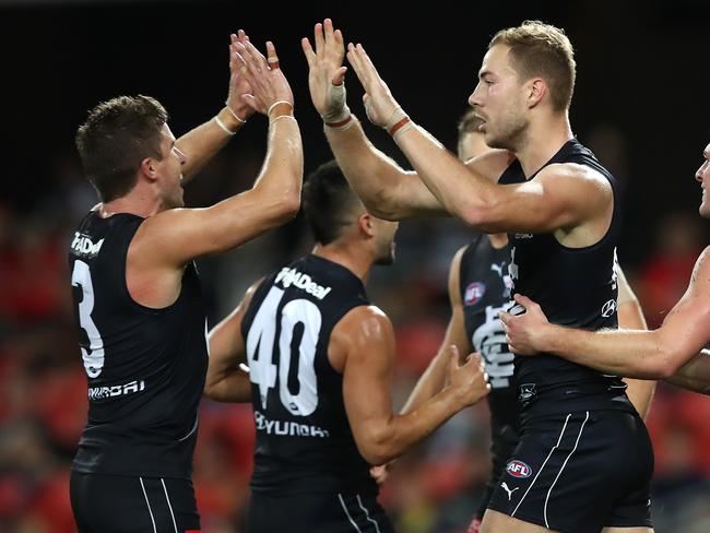 GOLD COAST, AUSTRALIA - APRIL 10: Harry McKay of the Blues celebrates a goal during the round four AFL match between the Gold Coast Suns and the Carlton Blues at Metricon Stadium on April 10, 2021 in Gold Coast, Australia. (Photo by Jono Searle/AFL Photos/via Getty Images)