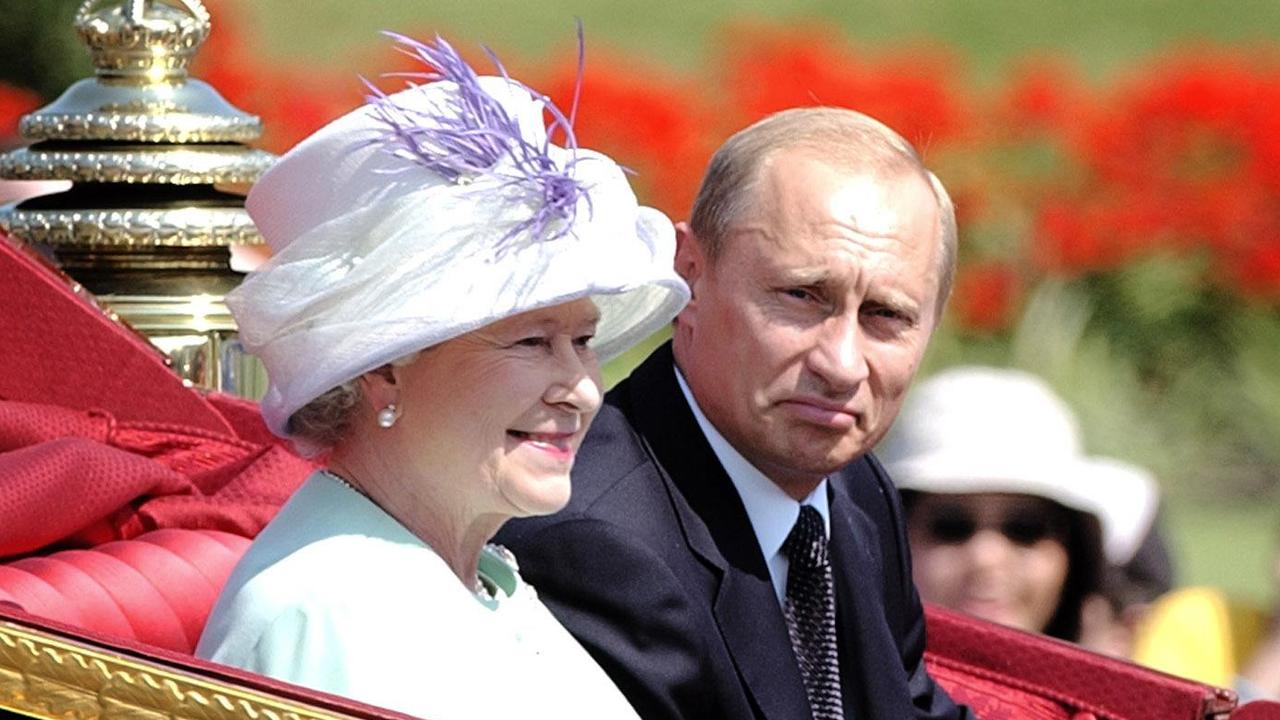 Britain's Queen Elizabeth II and Russian President Vladimir Putin at Buckingham Palace during his 2003 UK visit. Picture: Stefan Rousseau – PA Images/PA Images via Getty Images.