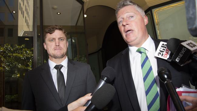 NRL star Brett Finch photographed with his lawyer Paul McGirr leaving the Downey Centre. Picture: NewsWire / Monique Harmer