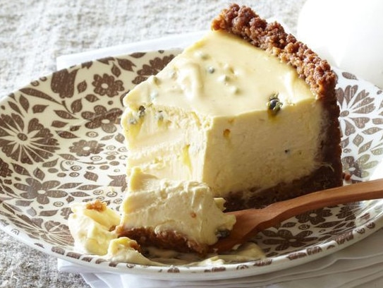 Baked sour cream and passionfruit cheesecake.