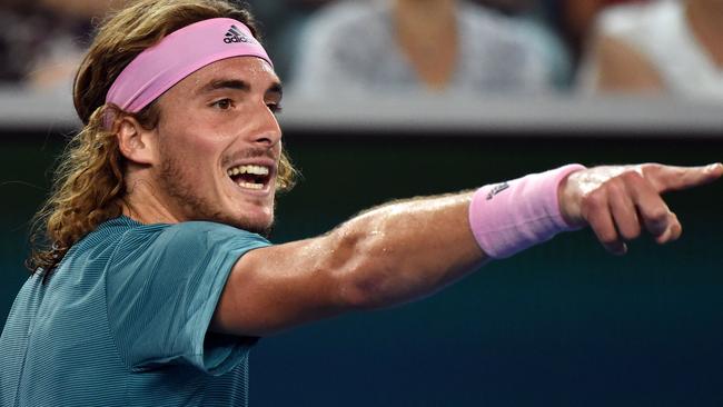 Stefanos Tsitsipas reacts after a point against Nikoloz Basilashvili.