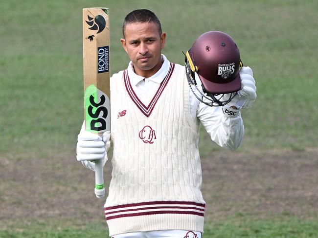 HOBART, AUSTRALIA - MARCH 06: Usman Khawaja of Queensland celebrates scoring a century during the Sheffield Shield match between Tasmania Tigers and Queensland Bulls at Blundstone Arena, on March 06, 2025, in Hobart, Australia. (Photo by Steve Bell/Getty Images)