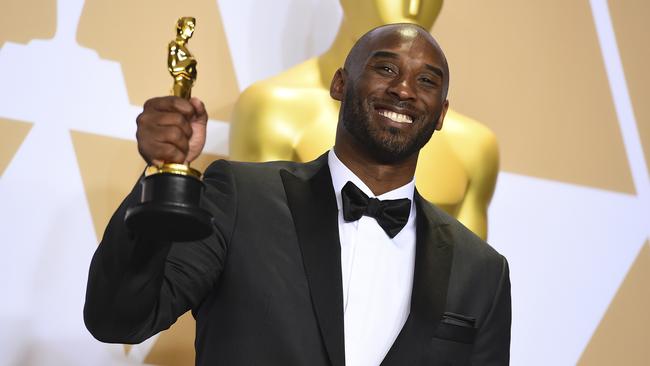 Bryant with his Oscar for best animated short for Dear Basketball. Picture: AP