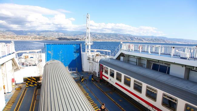 Trains on the ferry between Sicily and Calabria. Picture: Alamy