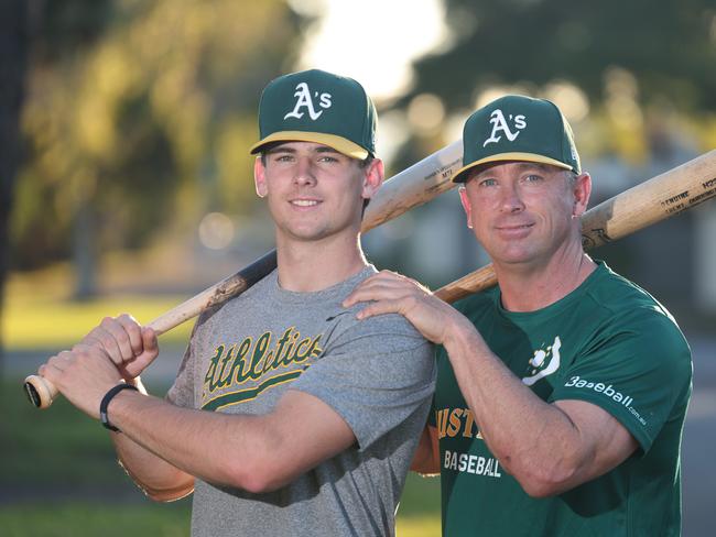 Gold Coast 17yo Max Durrington has signed with the Oakland Athletics in the Major Leagues in the USA. Max Durrington with his father Trent Durrington,(green shirt) who also played in the Major Leagues. Picture Glenn Hampson