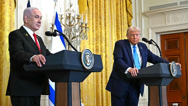 Israeli Prime Minister Benjamin Netanyahu and US President Donald Trump in the East Room of the White House on Wednesday (AEDT). Picture: AFP