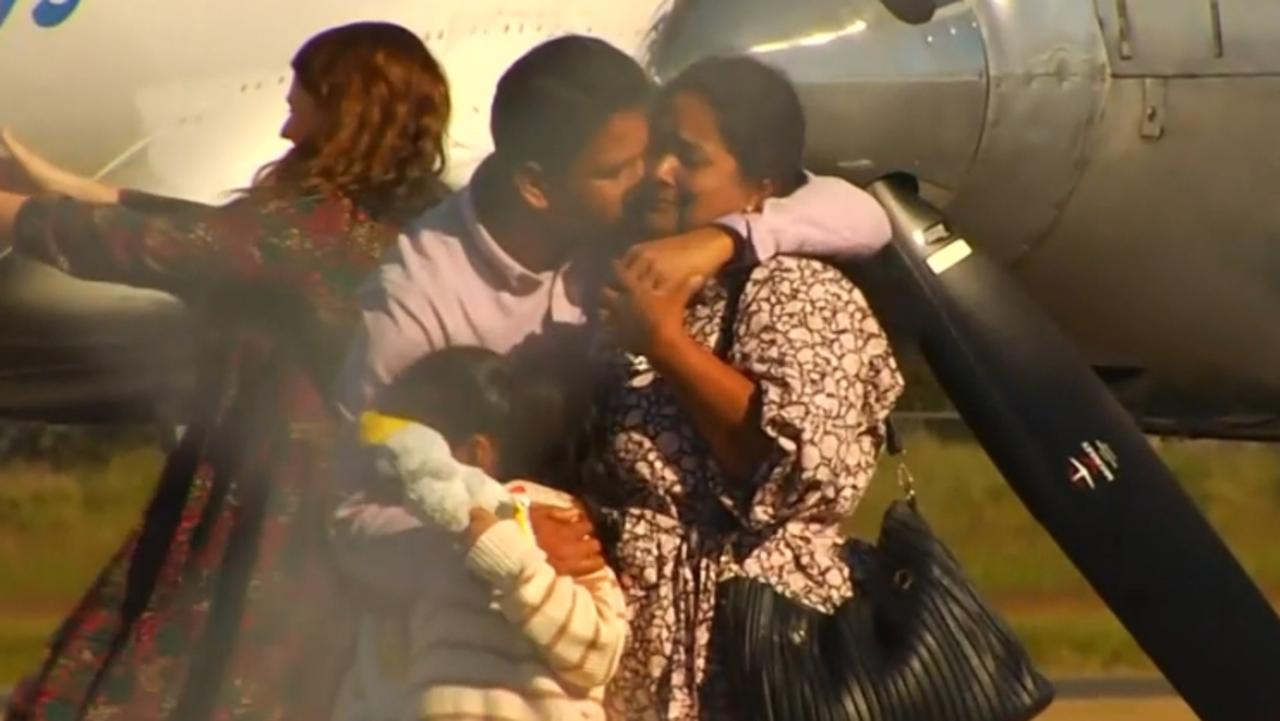 The Nadesalingam family land at Thangool Airport. Picture: ABC News