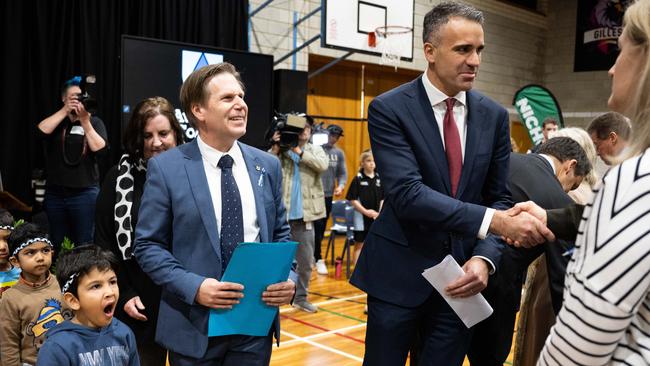 Premier Peter Malinauskas announced the funding at the opening of Avenues College, Windsor Gardens … but one little student found the whole thing a little yawn-worthy. Picture: NCA NewsWire/Morgan Sette