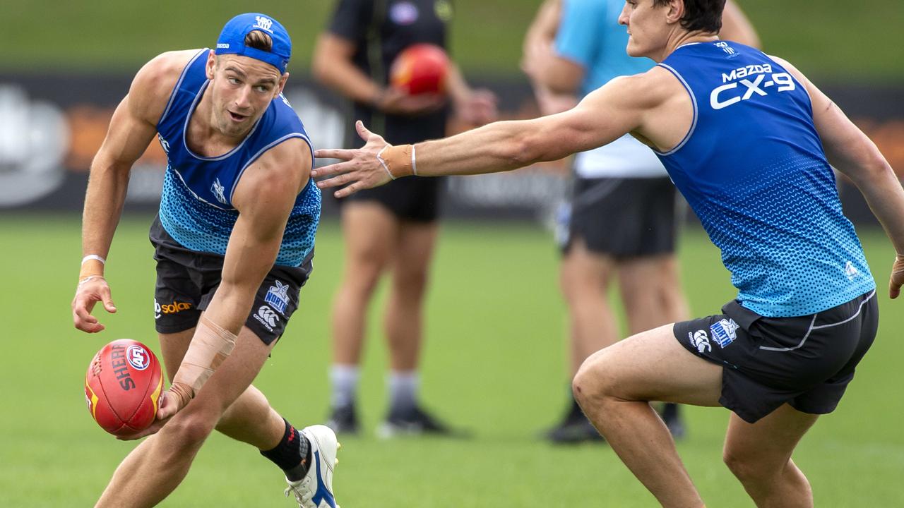 Will former Demon Dom Tyson, left, make an impact at the Kangaroos in 2019?