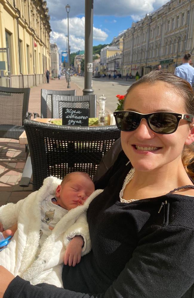 Sophie Labaune Parkinson and baby Liam at a cafe in Ukraine. Picture: Supplied