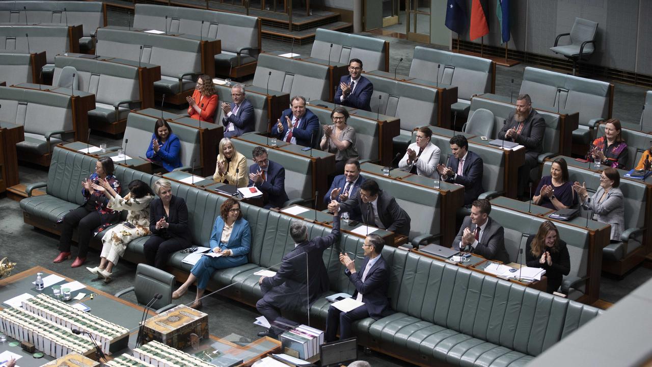 Attorney-General Mark Dreyfus gets a high five from one of his colleagues after the NACC passed. Picture: NCA NewsWire / Gary Ramage