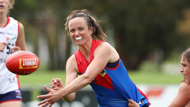 MELBOURNE. 11/12/2021. AFLW. Melbourne AFLW intra club practise match at Casey Fields, Cranbourne. Daisy Pearce clears by hand during todays intra club practise match ... Photo by Michael Klein.