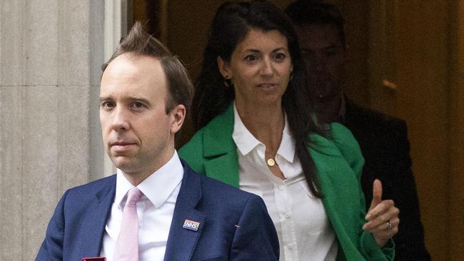 Matt Hancock leaves 10 Downing Street with aide Gina Coladangelo in May last year. Picture: Dan Kitwood/Getty Images