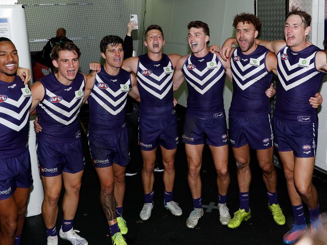 GEELONG, AUSTRALIA - APRIL 30: Fremantle sing the team song during the 2022 AFL Round 07 match between the Geelong Cats and the Fremantle Dockers at GMHBA Stadium on April 30, 2022 in Geelong, Australia. (Photo by Dylan Burns/AFL Photos via Getty Images)