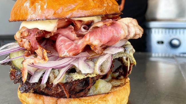 This week’s special Boozy Burger with a beef patty, latkes, pastrami, horse radish aioli, and Swiss cheese on a pretzel bun.