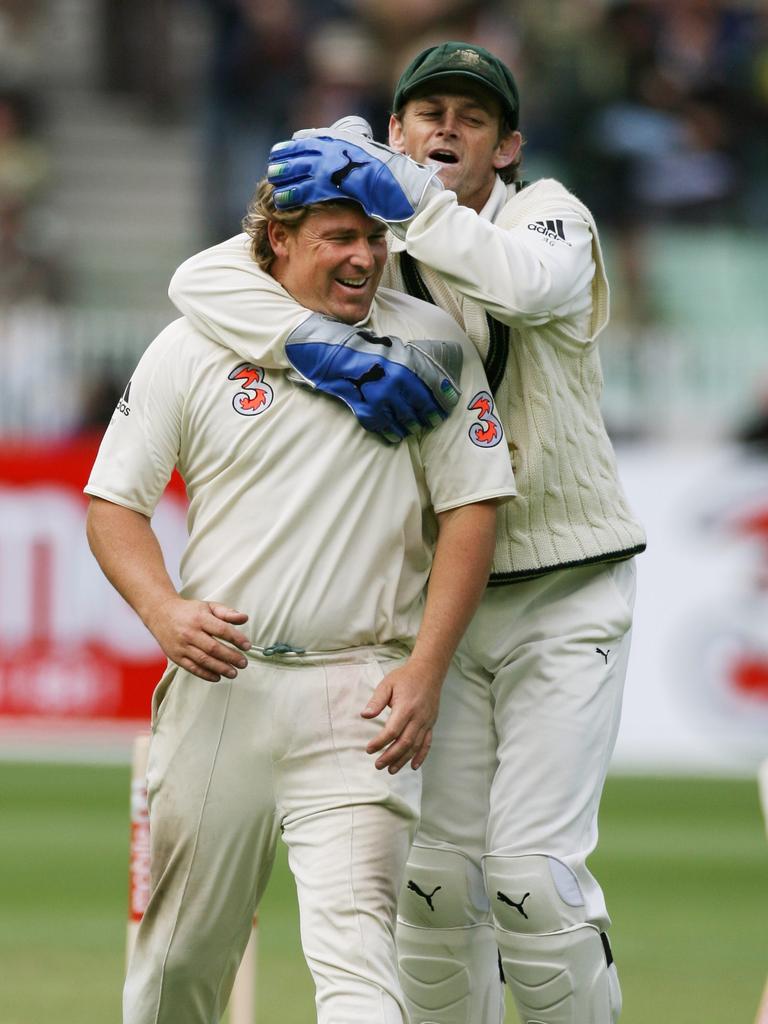 Adam Gilchrist celebrates another Warne wicket.