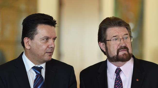 Nick Xenophon Team Senator Nick Xenophon (left) and Justice Party Seator Derryn Hinch speak to the media during a press conference at Parliament House in Canberra. (AAP Image/Lukas Coch)