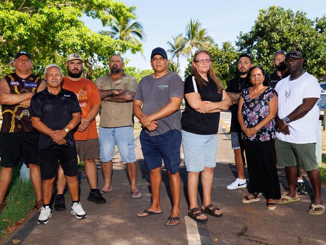 Shawn Lewfatt (centre left) and Lisa Burkenhagen (centre right) are two of the NT Aboriginal Community Police Officers who are taking the NT government and NT police commissioner to the Australian Human Rights Commission, claiming racial discrimination and racist conduct. Lewfatt and Burkenhagan are pictured here with other officers taking part in the legal challenge. Picture: Charlie Bliss