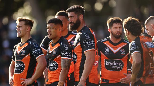 `James Tamou of the Tigers and his team look dejected after a try during the round 25 NRL match between the Wests Tigers and the Canberra Raiders at Leichhardt Oval, on September 04, 2022, in Sydney, Australia.