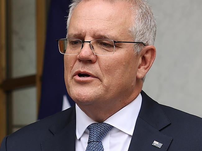 CANBERRA, AUSTRALIANewsWire Photos NOVEMBER, 22, 2021: The Prime Minister Scott Morrison with a fly during a press conference in Parliament House Canberra. Picture: NCA NewsWire / Gary Ramage