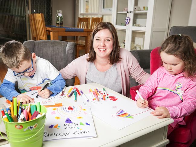 Kate Ruff’s kids Cooper, 6, and Miranda, 4, making her a Mother’s Day card. Picture: Nicole Cleary