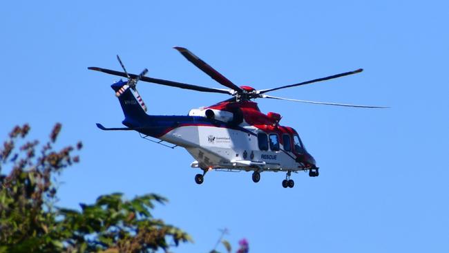 The Queensland Government Air (QGAir) rescue helicopter taking off from Ingham Hospital travelling to Townsville University Hospital on Monday. Picture: Cameron Bates