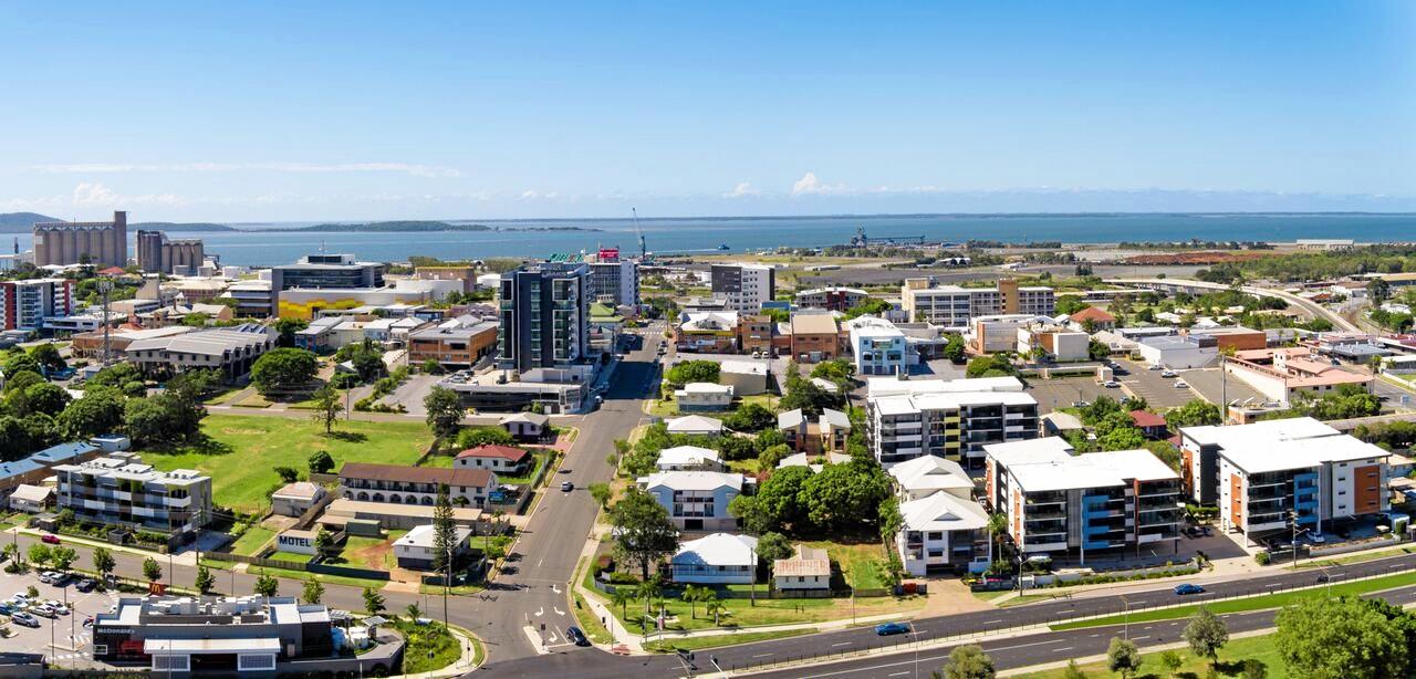 LJ Hooker has listed 81 Goondoon St, where Commonwealth Bank, Uber Hair and Hello World are, for sale.
