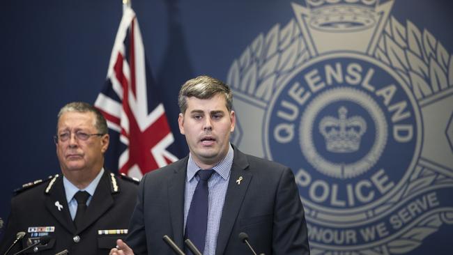 Police Minister Mark Ryan (right) and Queensland Police Commissioner Ian Stewart speak to the media after releasing the Queensland Police Service 2016-17 Annual Statistical Review in Brisbane. (AAP Image/Glenn Hunt)