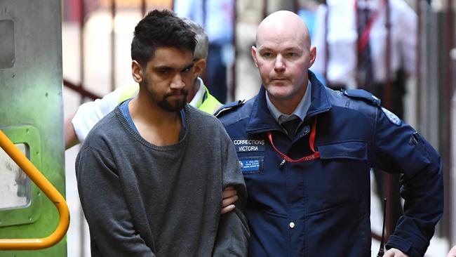 Codey Herrmann, left, arrives at the Supreme Court in Melbourne.