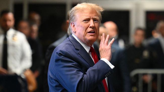 Donald Trump speaks to the press at Manhattan Criminal Court after a hearing in his case of paying hush money to cover up extramarital affairs. Picture: AFP