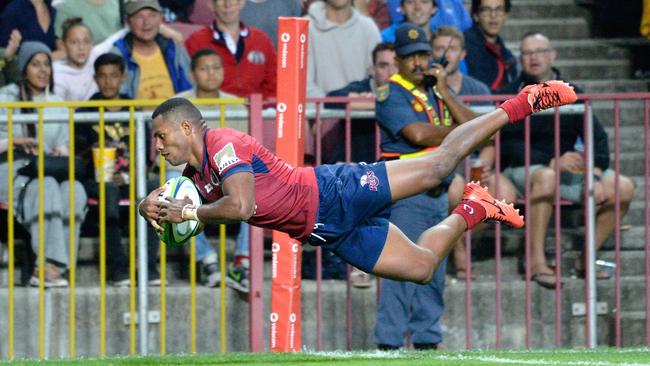 Reds winger Filipo Daugunu dives over for a late try against the Stormers in Cape Town. Picture: AFP