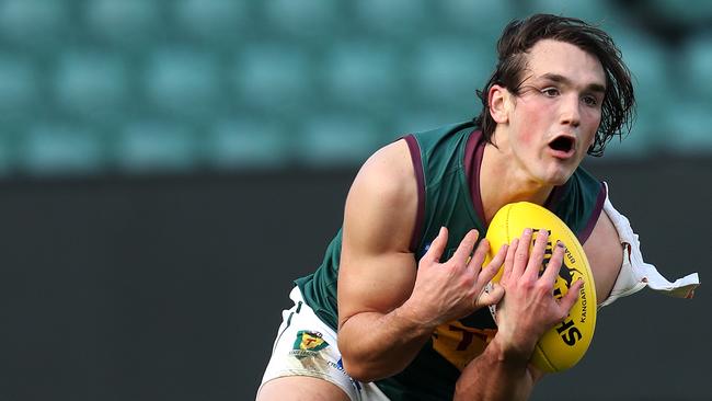 Tasmania’s Aiden Grace marks during the game against Vic Metro at UTAS Stadium. Picture: CHRIS KIDD