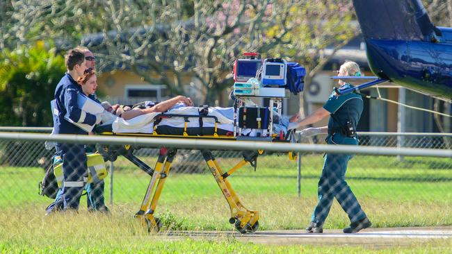 A patient being loaded at Ayr Hospital. Picture: NewsWire/Scott Radford-Chisholm