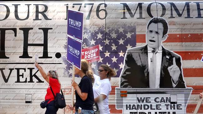 Trump supporters outside the venue of the Republican candidates’ debate in Milwaukee, where their hero will be a no-show. Picture: AFP