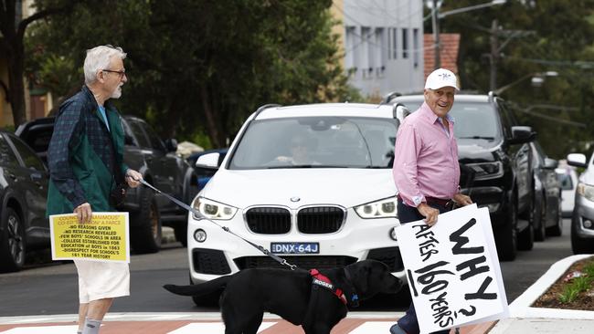 Anti-coed Newington College protesters walking towards the school in a silent protest against the proposed switch to Newington College becoming a co-ed school. Picture: Richard Dobson