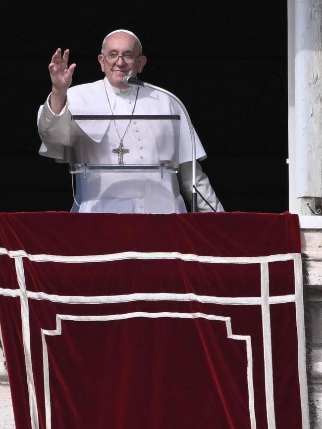 Pope Francis overlooking St. Peter's square in The Vatican. Picture: AFP