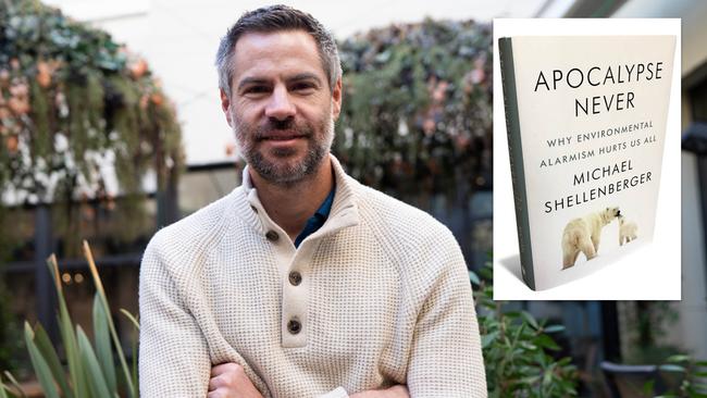 Michael Shellenberger with his book Apocalypse Never: Why Environmental Alarmism Hurts Us All.