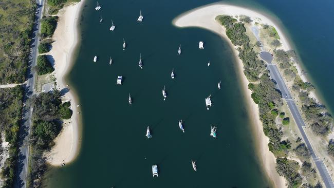 An aerial view of yachts and houseboats moored in 'Bums Bay' at Main Beach on the Gold Coast. (AAP Image/Dave Hunt)