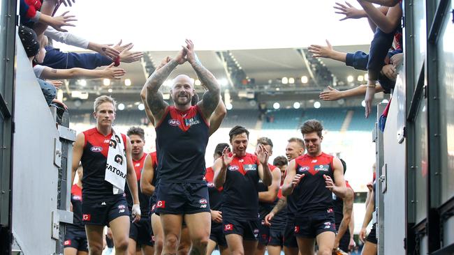 Nathan Jones leads his team off after beating North Melbourne. Picture: Michael Klein