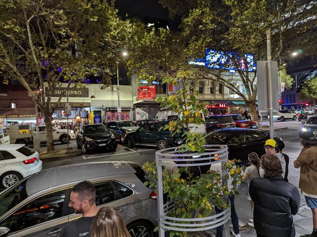 The standoff drew a crowd of onlookers. Picture: Reddit.