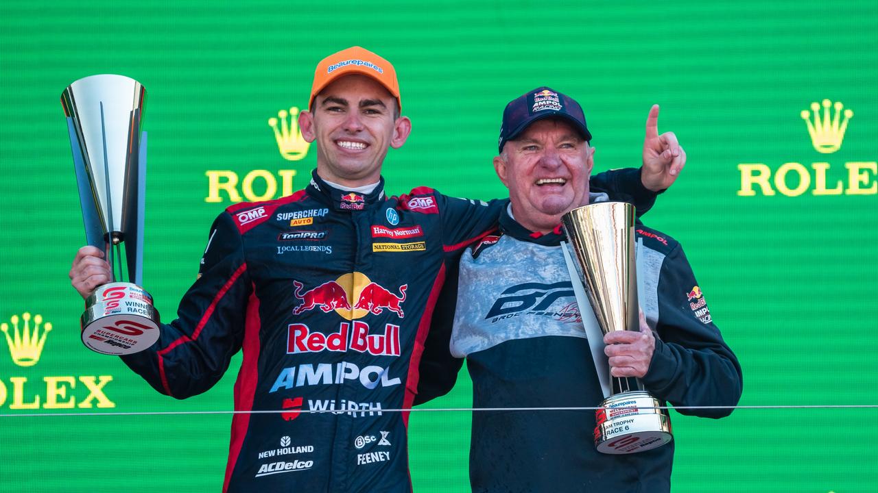 Broc Feeney celebrates his win at Albert Park with father Paul. Picture: Daniel Kalisz/Getty Images