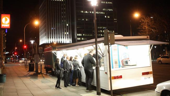 Customers line up at the pie cart on Franklin Street.