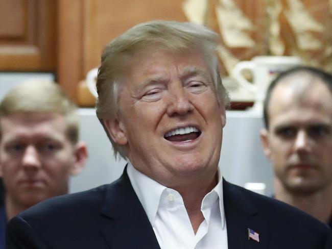 President Donald Trump speaks to members of the U.S. Coast Guard at the Lake Worth Inlet Station, on Thanksgiving, Thursday, Nov. 23, 2017, in Riviera Beach, Fla. (AP Photo/Alex Brandon)