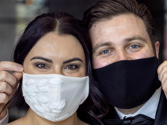 MELBOURNE, JULY 29, 2021: Bride to be Connie Carusello and fiance John Barbuscio have decided to continue with their plans to wed next Sat. With masks expected to be mandatory for quite some time. Designer  Jason Grech has create a beaded mask to match her dress. Picture: David Geraghty