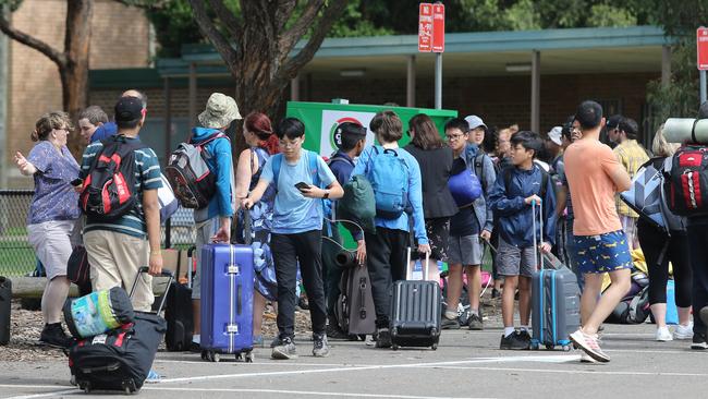 Students from Epping Boys High school return from a school camp. John Feder/The Australian