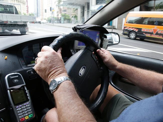 Taxi drivers say they are burdened by excessive regulation and fees. Picture: Liam Kidston