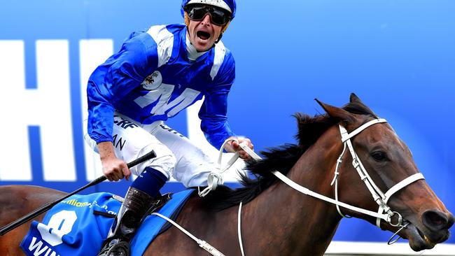 Hugh Bowman celebrates Winx’s stunning win in last year’s Cox Plate. Picture: Nicole Garmston