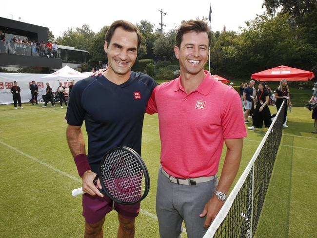 Tennis superstar Roger Federer and Aussie golf star Adam Scott UNI QLO at Royal South Yarra Tennis Club.  Picture: David Caird