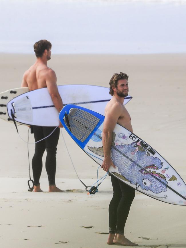 Chris and Liam sizing up the surf. Picture: Media Mode